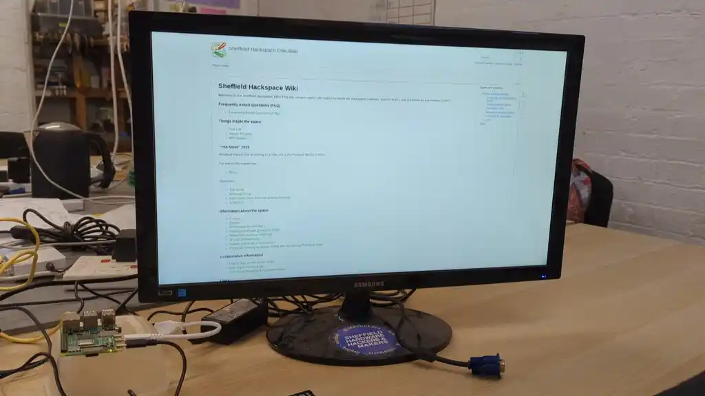 picture of TV screen, showing a webpage